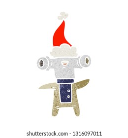 friendly hand drawn retro cartoon of a alien wearing santa hat