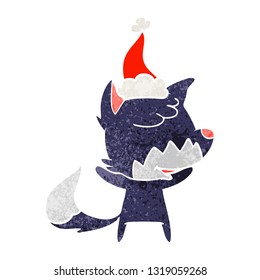 friendly hand drawn retro cartoon of a fox wearing santa hat