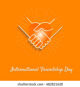Friendly handshakes and heart as a symbol of unity, compliance, partnership, greetings on the orange background. Friendship Day.