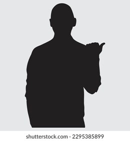 A friendly man in his 30s pointing towards copy space and smiling silhouette of a person