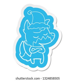 friendly quirky cartoon  sticker of a fox wearing santa hat