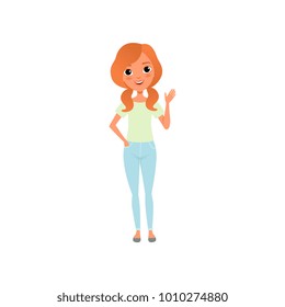 Friendly red-haired girl with twintails standing and waving hand. Cartoon teenager in blue jeans and green blouse. Stylish female clothes. Colorful flat vector design