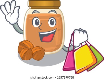 A friendly rich walnut butter waving and holding Shopping bag