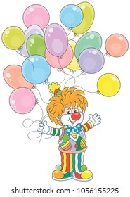 Friendly smiling circus clown with colorful holiday balloons