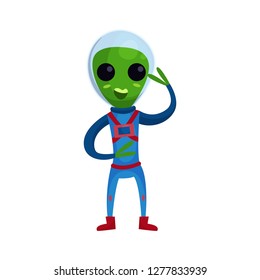 Friendly smiling green alien with big eyes wearing blue space suit waving his hand, alien positive character cartoon vector Illustration