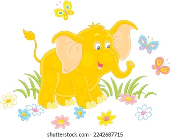 Friendly smiling little baby elephant playing with merrily fluttering butterflies on a green summer field with colorful flowers, vector illustration isolated on a white background