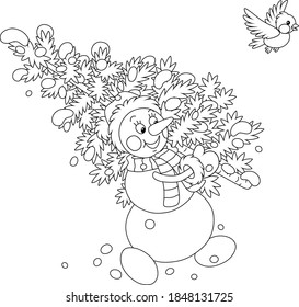 Friendly smiling snowman with a warm hat, a scarf and mittens carrying a prickly fir tree from a snowy winter forest to decorate it for Christmas and New Year