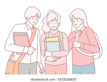 In a friendly and welcoming environment, three cheerful students interact while holding their books together