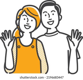 Friendly young couple waving hands