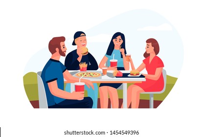 Friends Eating Fast Food Meal In Restaurant. Group Of Happy People Sitting, Talking And Having Dinner Burgers, Fries And Drinking Soda. Young Fun And Smiling Men And Women Together.