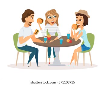 Friends Eating Fast Food Meal In Restaurant. Group Of Happy People Sitting, Talking And Having Dinner Burgers, Fries And Drinking Soda. Young Fun And Smiling Man And Women Together.