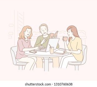 Friends at open air cafe and chatting together in line art Friends at open air cafe and chatting together in line art
