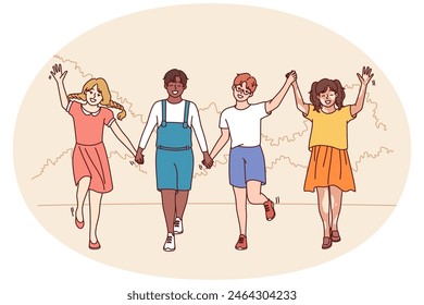Friends teenagers diversity nationalities and races walk in park holding hands enjoying friendship and spending summer holidays together. Multiethnic boys and girls for concept diversity in society