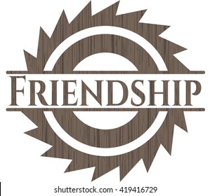 Friendship badge with wooden background