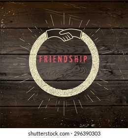 Friendship badges logos and labels for any use, for example design of cards or presentations, on wooden background texture