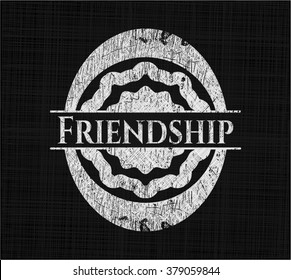 Friendship chalkboard emblem written on a blackboard