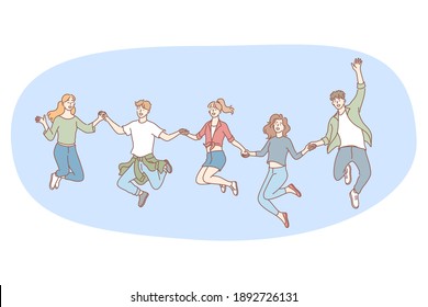 Friendship, happiness, fun concept. Group of smiling cheerful children friends holding hands and jumping together during walk or party celebration. Fun leisure recreation for teens children 