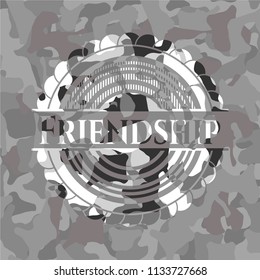 Friendship on grey camouflaged pattern