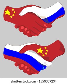 
The friendship of the peoples of Russia and China Shake hand. Two Flags