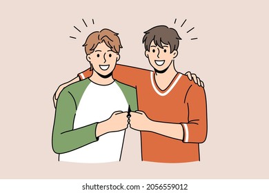 Friendship and positive emotions concept. Two young smiling happy men friends standing pulling fists together as symbol of unity and friendship vector illustration 