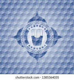 fries icon inside blue emblem or badge with geometric pattern background.