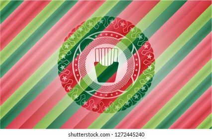 fries icon inside christmas colors style badge.