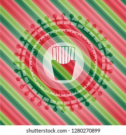 fries icon inside christmas colors style badge.