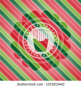 fries icon inside christmas colors style badge.