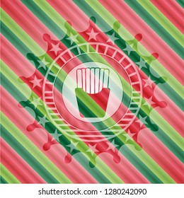 fries icon inside christmas style emblem.