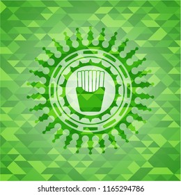 fries icon inside green mosaic emblem