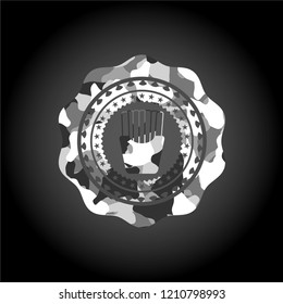 fries icon inside grey camouflaged emblem