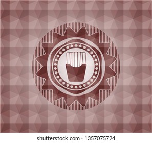 fries icon inside red seamless emblem with geometric pattern background.