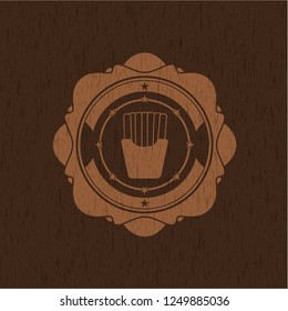 fries icon inside wooden emblem