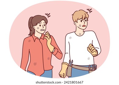 Frightened man with repair tools and woman in dirty clothes looking away. Guy and girl in rubber gloves with discouraged face after making mistake while repairing their own hands. Flat vector image