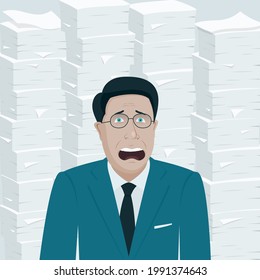 Frightened, tired and annoyed office worker or boss amid piles of papers and documents.