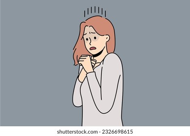 Frightened woman is afraid of resounding sounds or movements and is panicking due to psychological health problems. Frightened young girl needs protection or treatment for panic attacks