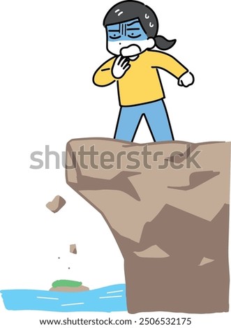A frightened woman looking down the cliff
