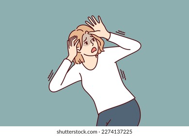 Frightened woman panicking and trying to dodge covering head with hands feeling danger and threat. Frightened girl screaming in fear suffering from phobia or panic attacks due to psychological problem