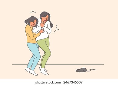 Frightened women scream at sight of mouse or rat running past, suffering from musophobia. Suriphobia causes panic in mother and daughter who saw live mouse and were in awe of small rodent