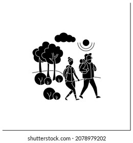 Friluftsliv glyph icon. Family hiking. Man and woman walking in forest. Green tourism. Nature landscape. Nordic outdoor activities concept.Filled flat sign. Isolated silhouette vector illustration