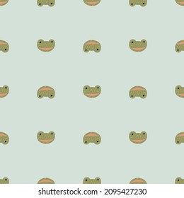Frog pattern seamless in freehand style. Head predator on colorful background. Vector illustration for textile prints, fabric, banners, backdrops and wallpapers.