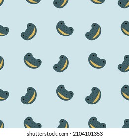 Frog pattern seamless in freehand style. Head predator on colorful background. Vector illustration for textile prints, fabric, banners, backdrops and wallpapers.