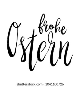 Frohe Ostern Happy Easter in German hand written brush lettering isolated on white.