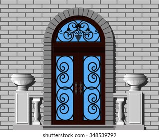 front door of house decorated with stucco 