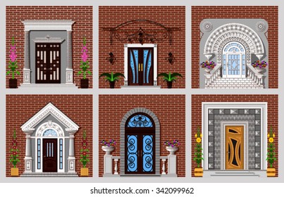 Front doors of different designs on brick wall background