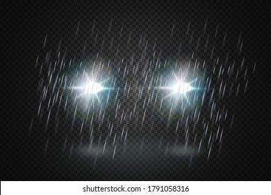  Front glowing beams of the car in the rain.Realistic blue rays round transport headlights in smoke,  fog or dust.Isolated on black background.