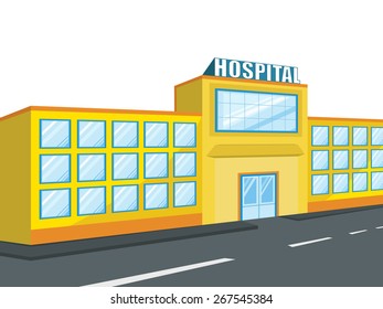 Front view of a big hospital building with two ambulance standing outside.