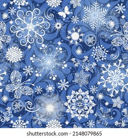 Frosty blue Christmas pattern with stylized lacy snowflakes, butterflies and leaves. Seamless texture. Vector eps 10