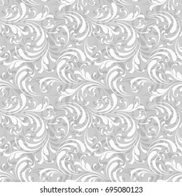 Frosty pattern. Lace ornament for decoration. Leaves, flowers and swirls. Floral design element. Winter background.