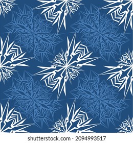 Frosty rhythmic geometric pattern. Pattern of blue and white snowflakes